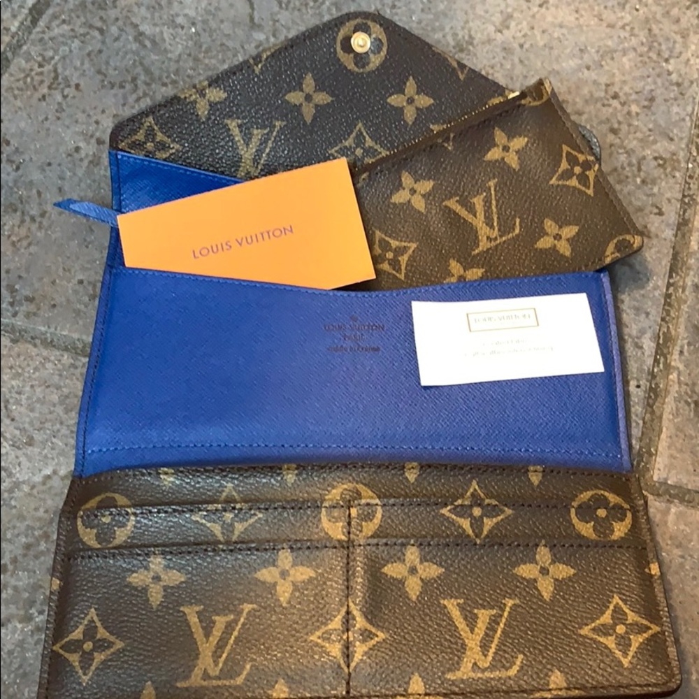 SOLD.    Authentic Awesome Louis Vuitton Wallet!